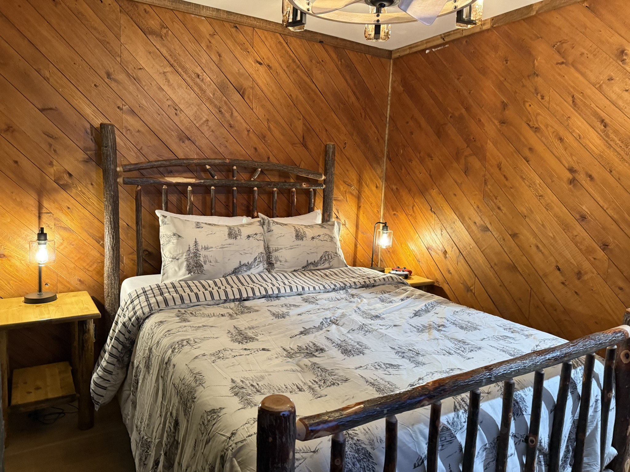 auxiliary bedroom featuring one, full sized bed for one or two guests