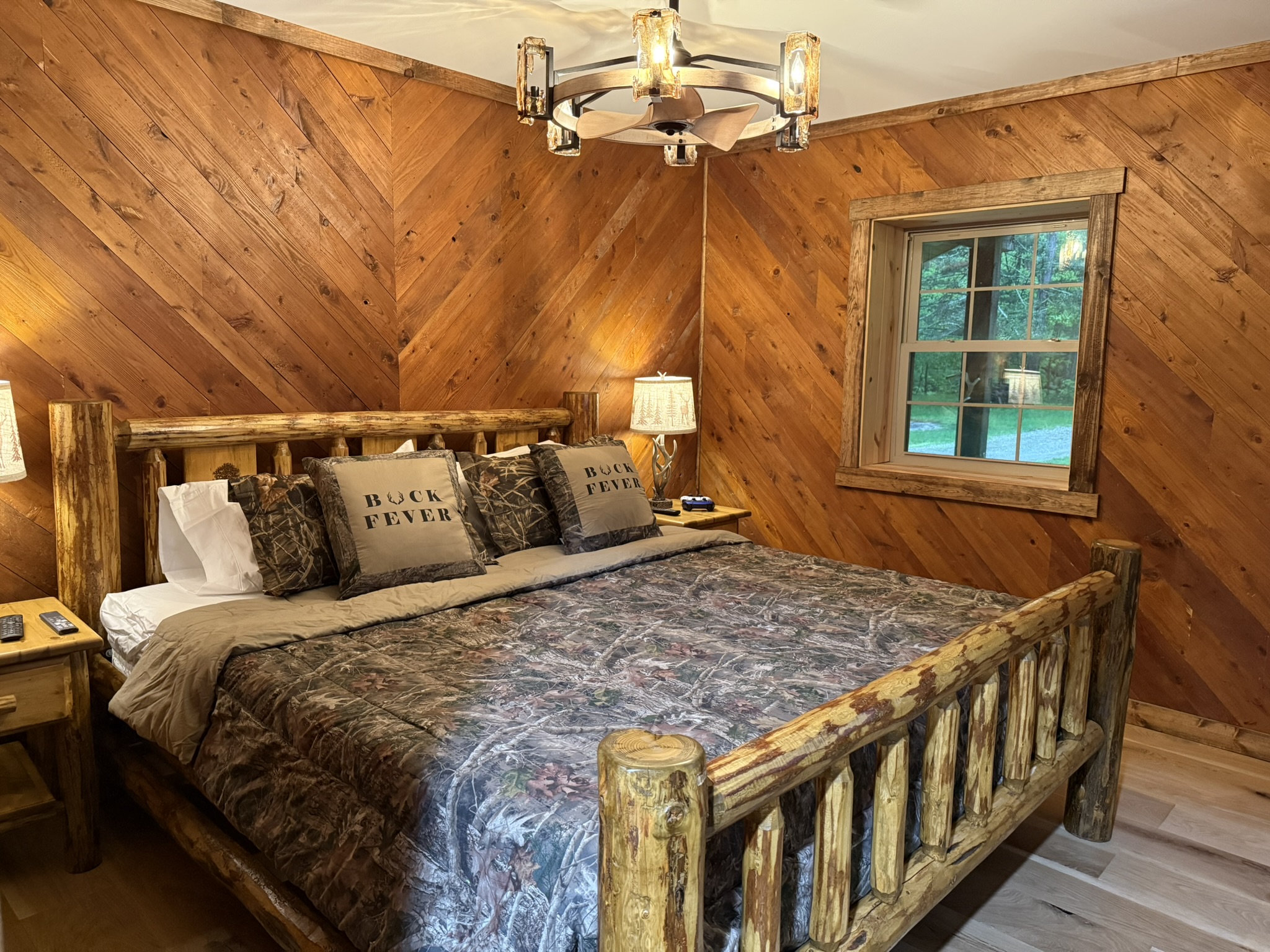 primary bedroom in the narrows cabin, featuring a king sized bed